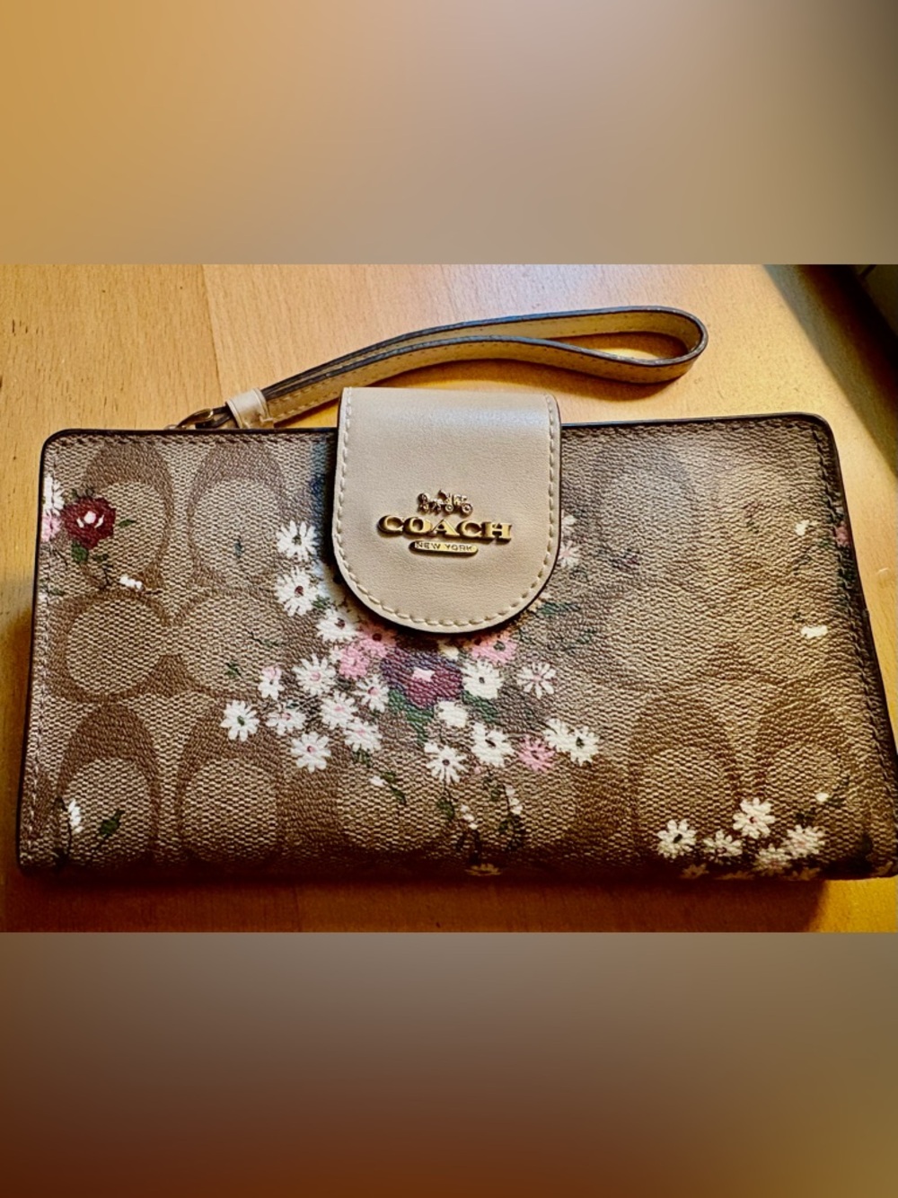 COACH Brown Signature Floral Wristlet with Beige Snap